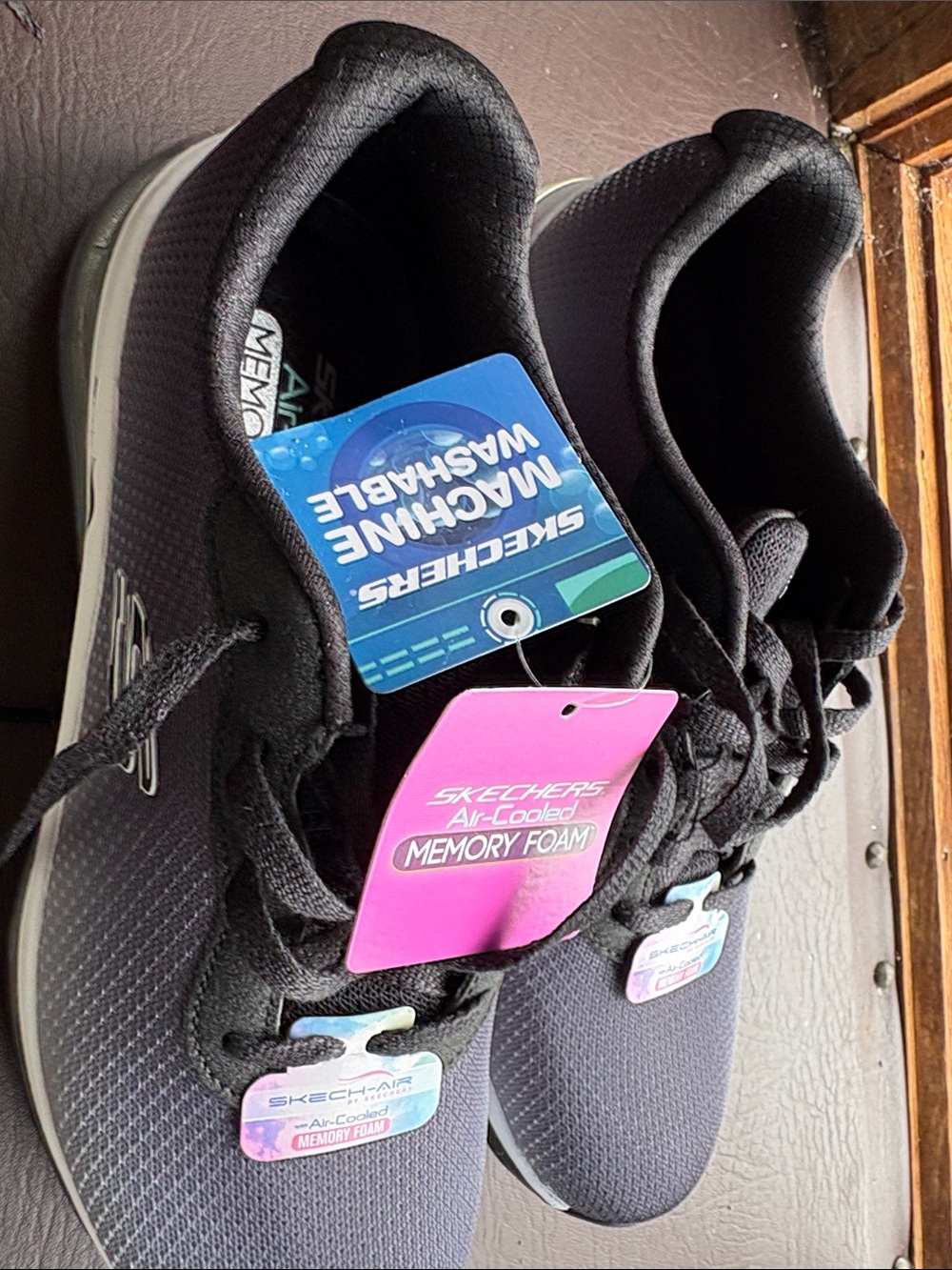 Skechers Black and White Women's Air-Cooled Memory Foam Sneakers